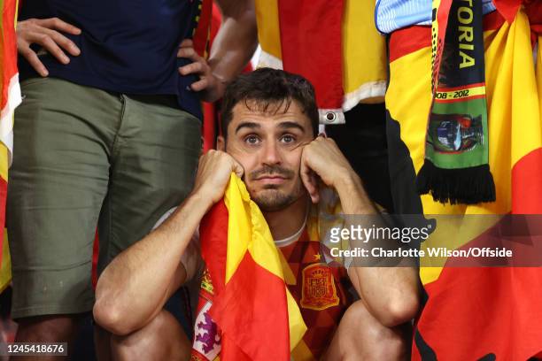 A Spanish supporter looking shocked after the penalty shootout defeat during the FIFA World Cup Qatar 2022 Round of 16 match between Morocco and...
