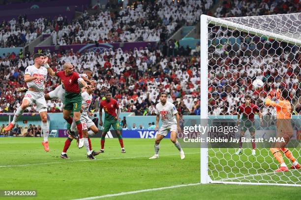 Pepe of Portugal scores a goal to make it 2-0 during the FIFA World Cup Qatar 2022 Round of 16 match between Portugal and Switzerland at Lusail...