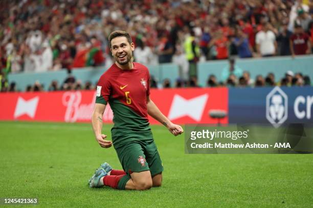 Raphael Guerreiro of Portugal celebrates after scoring a goal to make it 4-0 during the FIFA World Cup Qatar 2022 Round of 16 match between Portugal...