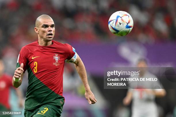 Portugal's defender Pepe eyes the ball during the Qatar 2022 World Cup round of 16 football match between Portugal and Switzerland at Lusail Stadium...