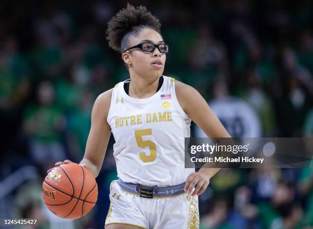 Olivia Miles of the Notre Dame Fighting Irish brings the ball up court during the game against the UConn Huskies at Joyce Center on December 4, 2022...