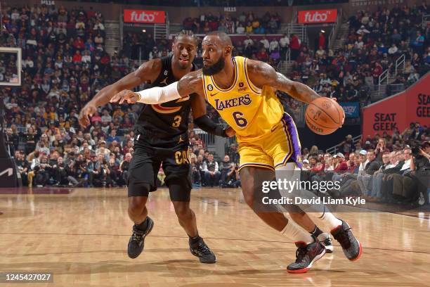 LeBron James of the Los Angeles Lakers dribbles the ball during the game against the Cleveland Cavaliers on December 6, 2022 at Rocket Mortgage...