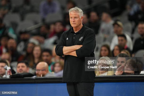 Assistant Coach Brett Brown looks on during the game against the New Orleans Pelicans on December 2, 2022 at the AT&T Center in San Antonio, Texas....