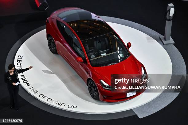 The Tesla Model 3 electric car is unveiled during Tesla's official launch event in Bangkok on December 7, 2022.