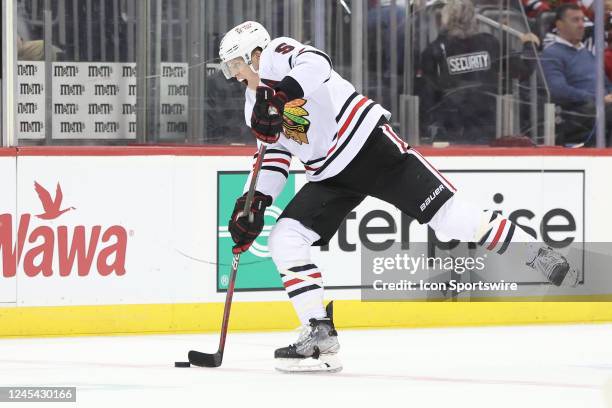 Chicago Blackhawks defenseman Connor Murphy skates with the puck during the National Hockey League game between the Chicago Blackhawks and the New...