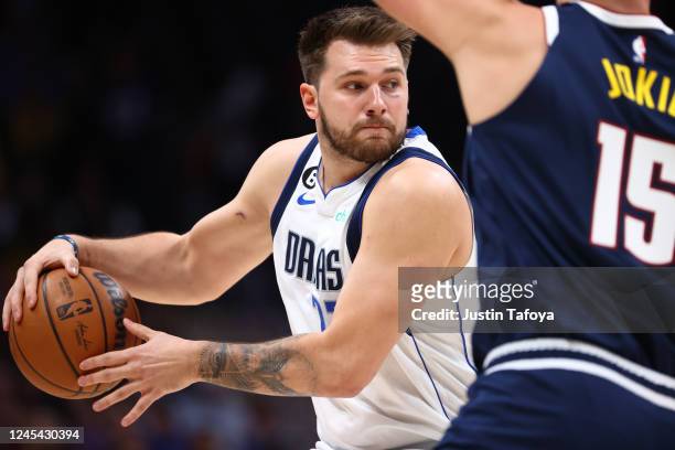 Luka Doncic of the Dallas Mavericks looks to pass against the Denver Nuggets in the first half at Ball Arena on December 6, 2022 in Denver, Colorado....