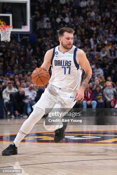 Luka Doncic of the Dallas Mavericks dribbles the ball during the game against the Denver Nuggets on December 6, 2022 at the Ball Arena in Denver,...