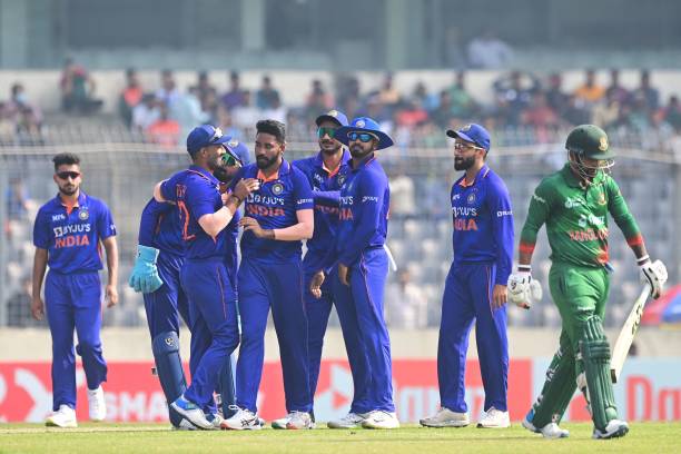 India's cricketers celebrate the dismissal of Bangladesh's Liton Das during the second one-day international cricket match between Bangladesh and...