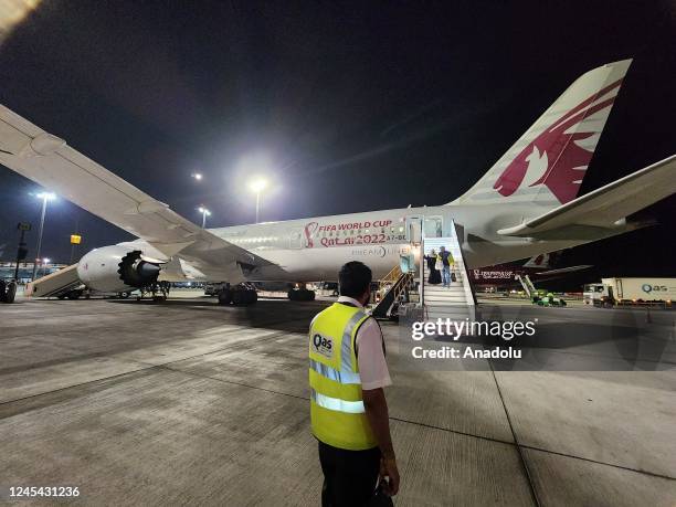 Football fans arrive at the Hamad international Airport ahead of the 2022 FIFA World Cup, prior to the finals at Doha, Qatar on December 07, 2022.