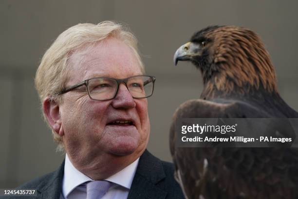 Jackson Carlaw MSP ,Convener of the Scottish Parliaments Citizen Participation and Public Petitions Committee with 15-year-old male golden eagle,...