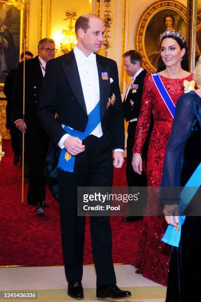 Prince William, Prince of Wales and Catherine Princess of Wales during a Diplomatic Corps reception at Buckingham Palace on December 6, 2022 in...