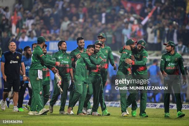 Bangladesh's players celebrate after their win in the second one-day international cricket match between Bangladesh and India at the Sher-e-Bangla...