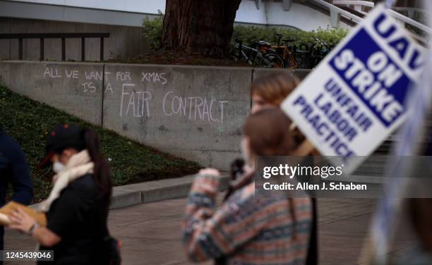 Irvine, CA A message is written on a wall as University of California picketers protest at University of California-Irvine in Irvine Tuesday, Dec. 6,...