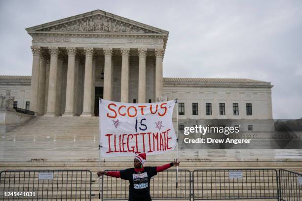 Nadine Seiler attends a rally for voting rights while the U.S. Supreme Court hears oral arguments in the Moore v. Harper case December 7, 2022 in...