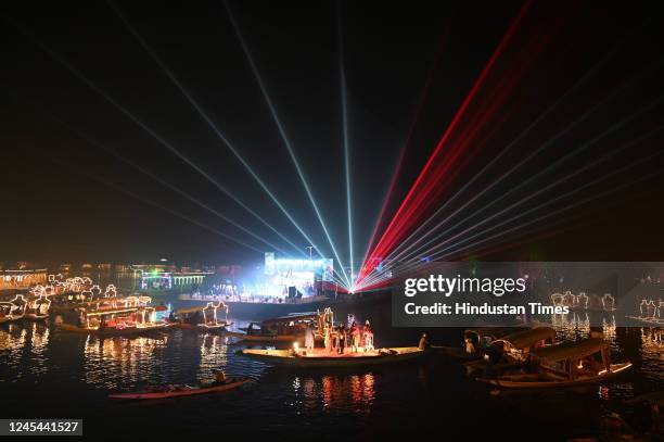 Shikaras gets illuminated with lights during houseboat festival in Dal Lake, on December 7, 2022 in Srinagar, India. The major attractions of the...