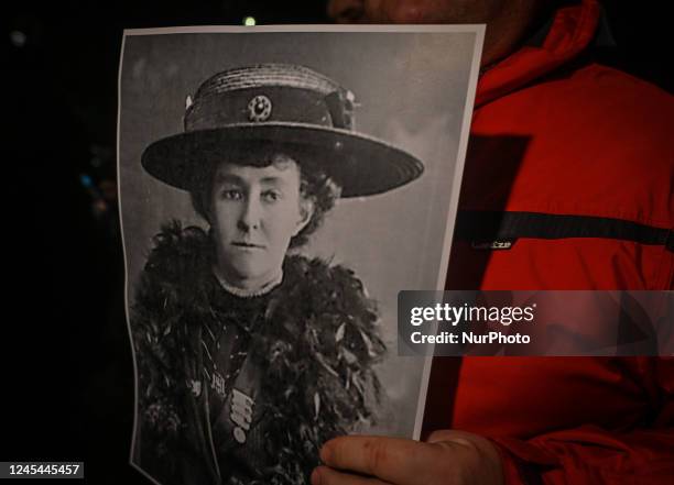 Protester holds a poster with an image of Emily Davison. Activists gather in front of the Law and Justice rulling party regional office during the...