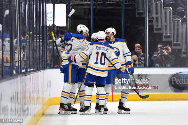 Tage Thompson of the Buffalo Sabres celebrates with teammates after scoring a goal during the first period of a game against the Columbus Blue...