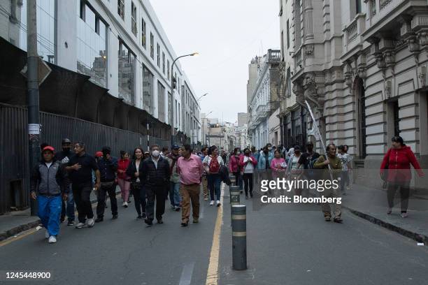 Supporters of Pedro Castillo, Peru's former president, protest his impeachment and arrest in Lima, Peru, on Wednesday, Dec. 7, 2022. After...
