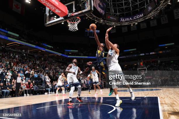 Rudy Gobert of the Minnesota Timberwolves blocks the shot during the game against the Indiana Pacers on December 7, 2022 at Target Center in...