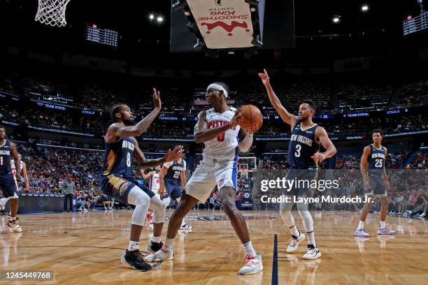 Jalen Duren of the Detroit Pistons looks to pass the ball during the game against the New Orleans Pelicans on December 7, 2022 at the Smoothie King...