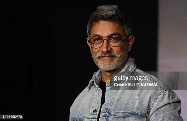 In this picture taken on December 7 Bollywood actor Aamir Khan poses for picture during the special screening of the Hindi film 'Salaam Venky' in...
