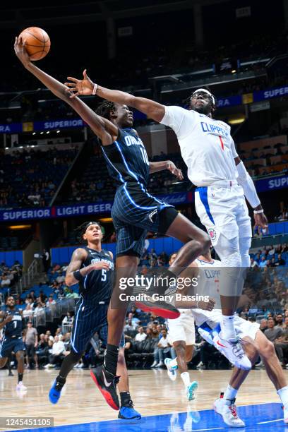 Bol Bol of the Orlando Magic drives to the basket during the game against the LA Clippers on December 7, 2022 at Amway Center in Orlando, Florida....