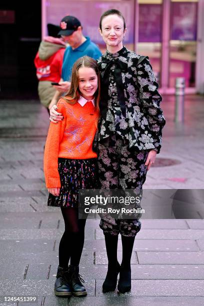 Alisha Weir and Andrea Riseborough attend Matilda Takes NY for Netflix at Times Square on December 07, 2022 in New York City.