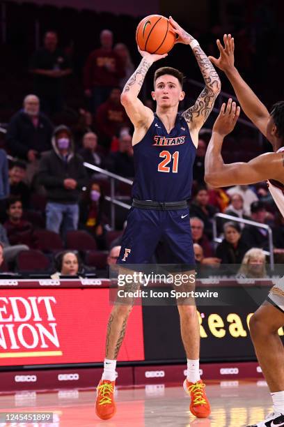 Cal State Fullerton Titans guard Dante Maddox Jr. Shoots a shot during the college basketball game between the Cal State Fullerton Titans and the USC...