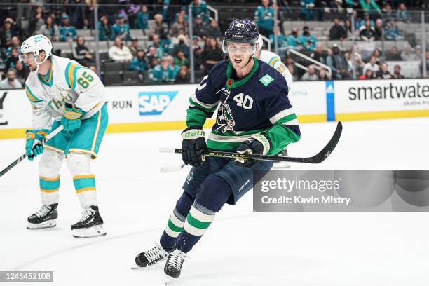 Elias Pettersson of the Vancouver Canucks celebrates scoring the game-winning goal in overtime against the San Jose Sharks at SAP Center on December...