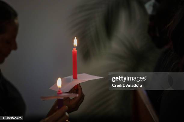 Inmates attend the celebration of 'Day of the Candles' at El Buen Pastor Women's Prison in Bogota, Colombia, on December 07, 2022. Colombian people...