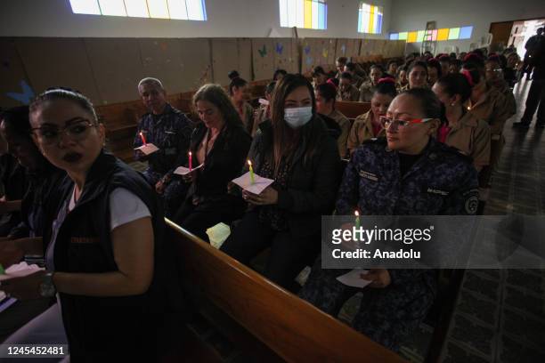 Inmates and prison guards attend the celebration of 'Day of the Candles' at El Buen Pastor Women's Prison in Bogota, Colombia, on December 07, 2022....