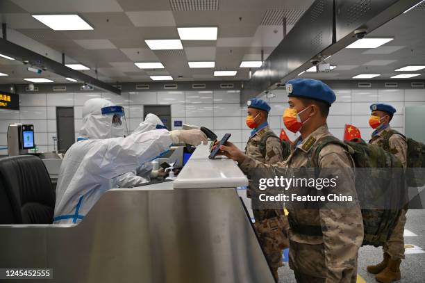 Chinese peacekeepers to be stationed in Juba, South Sudan in a United Nations peacekeeping mission, pass the border inspection at an airport in...