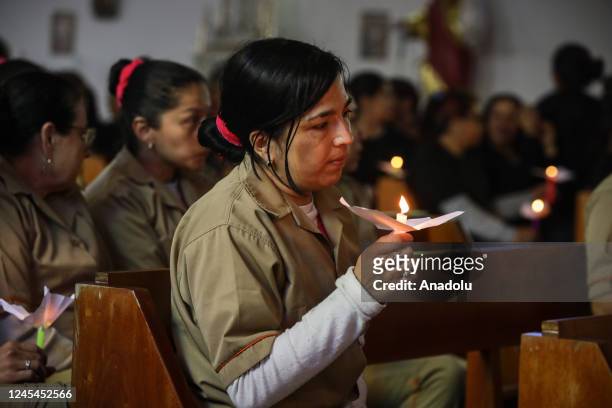 Inmates attend the celebration of 'Day of the Candles' at El Buen Pastor Women's Prison in Bogota, Colombia, on December 07, 2022. Colombian people...