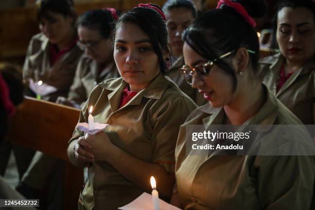 Inmates attend the celebration of 'Day of the Candles' at El Buen Pastor Women's Prison in Bogota, Colombia, on December 07, 2022. Colombian people...