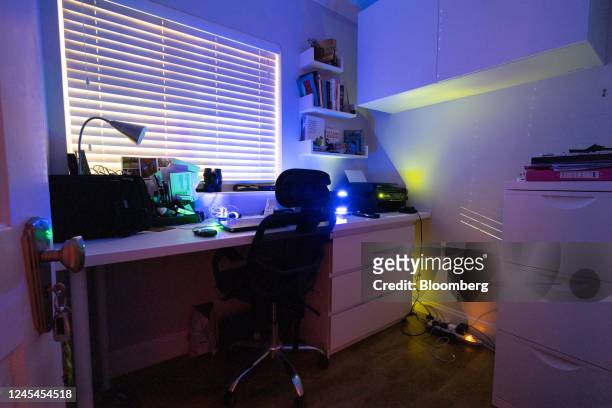 Long exposure photograph showing a study illuminated by lights from electrical devices left on at a home near Chelmsford, UK, on Wednesday, May 4,...