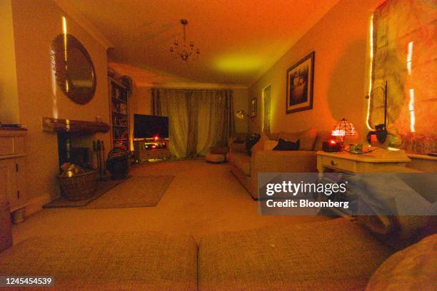 Long exposure photograph showing a lounge illuminated by lights from electrical devices left on at a home near Chelmsford, UK, on Wednesday, May 4,...