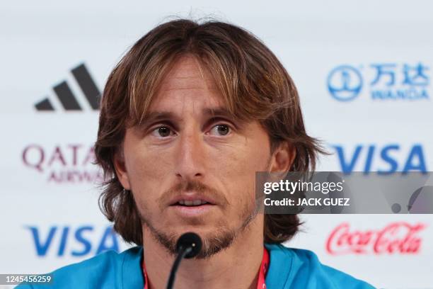 Croatia's midfielder Luka Modric speaks during a press conference at the Qatar National Convention Center in Doha on December 8 on the eve of the...