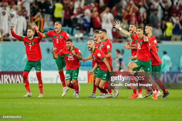 Moroccan national team jubilant after 3-0 win on penalties after the FIFA World Cup Qatar 2022 Round of 16 match between Morocco and Spain at...