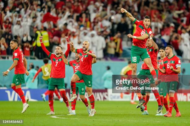 Moroccan national team jubilant after 3-0 win on penalties after the FIFA World Cup Qatar 2022 Round of 16 match between Morocco and Spain at...