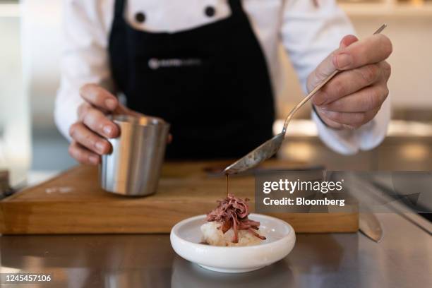 Chef prepares a dish of Japanese-style beef, made with shredded cultivated thin-cut steak, in the Aleph Farms Ltd. Development kitchen in Rehovot,...