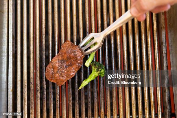 Chef grills a piece of cultivated thin-cut steak in the Aleph Farms Ltd. Development kitchen in Rehovot, Israel, on Sunday, Nov. 27, 2022. The UN...