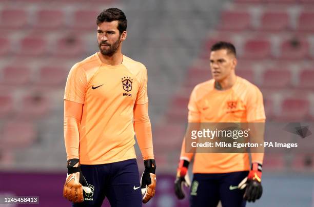 Brazil goalkeepers Alisson and Ederson during a training session at the Al Arabi SC Stadium in Doha, Qatar. Picture date: Thursday December 8, 2022.