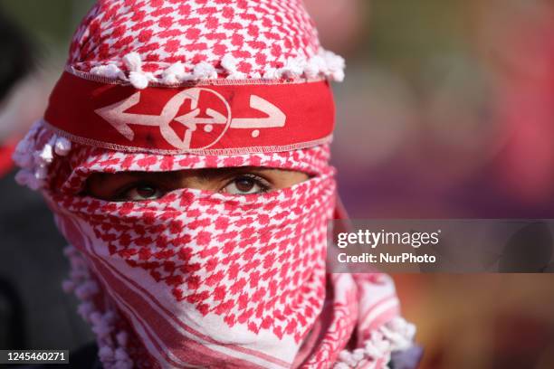 Supporters of Popular Front for the Liberation of Palestine mark the forty-fifth anniversary of the founding of their group during a rally in Gaza...