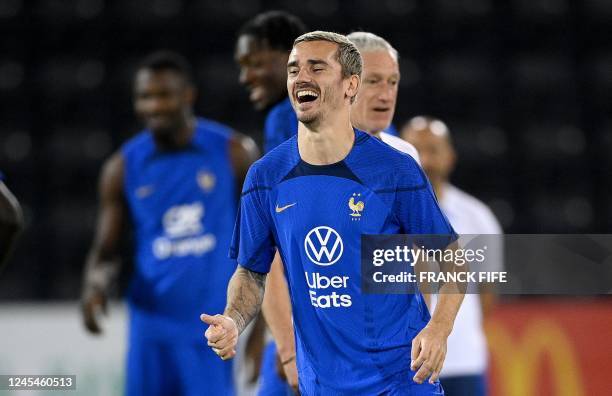 France's forward Antoine Griezmann takes part in a training session at the Al Sadd SC training center in Doha, on December 8 in the build-up to the...