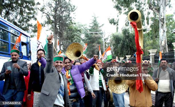 Congress supporters celebrating victory after winning in Himachal Pradesh state elections, on December 8, 2022 in Kullu, India. The Congress emerged...