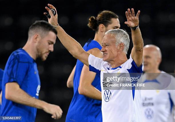 France's coach Didier Deschamps takes a training session at the Al Sadd SC training center in Doha, on December 8 in the build-up to the Qatar 2022...