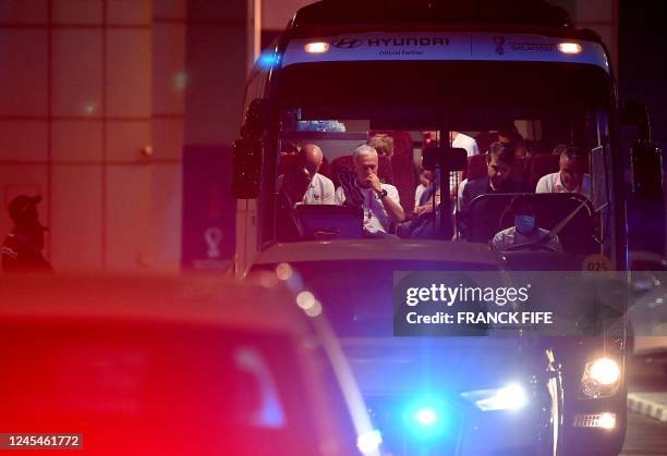 France's coach Didier Deschamps , together with coaches and players, on the bus after a training session at the Al Sadd SC training center in Doha,...