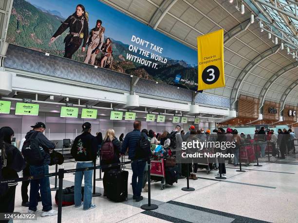 Long line of travelers waiting at Toronto Pearson International Airport in Mississauga, Ontario, Canada, on May 02, 2022. Pearson International...