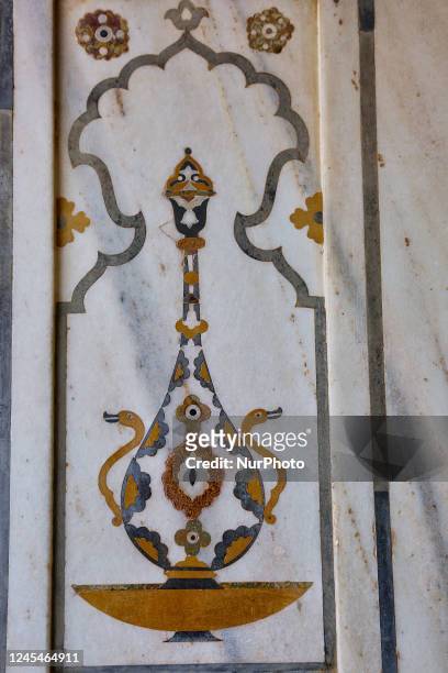Detail of the decorative stone inlay adorning the mausoleum of Itmad-ud-Daulah's tomb in Agra, Uttar Pradesh, India, on May 04, 2022. The Tomb of...
