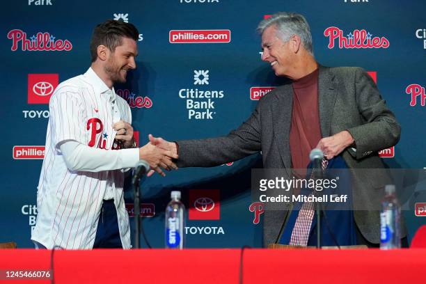 Trea Turner of the Philadelphia Phillies shakes hands with president of baseball operations Dave Dombrowski during his introductory press conference...